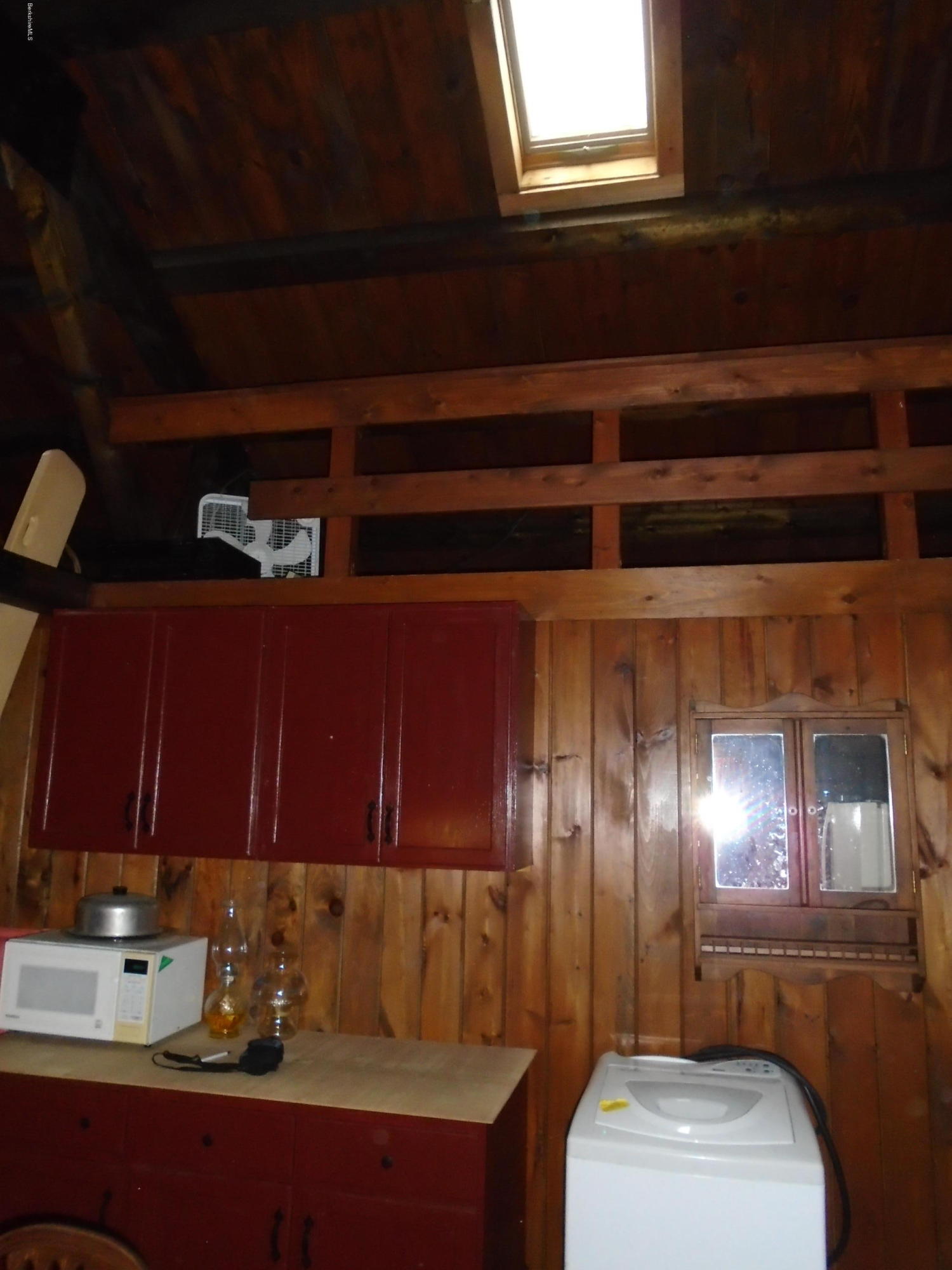 86 Peterson Road Becket, MA 01223 - Photo 20 of 52 a bathroom with a sink and a mirror