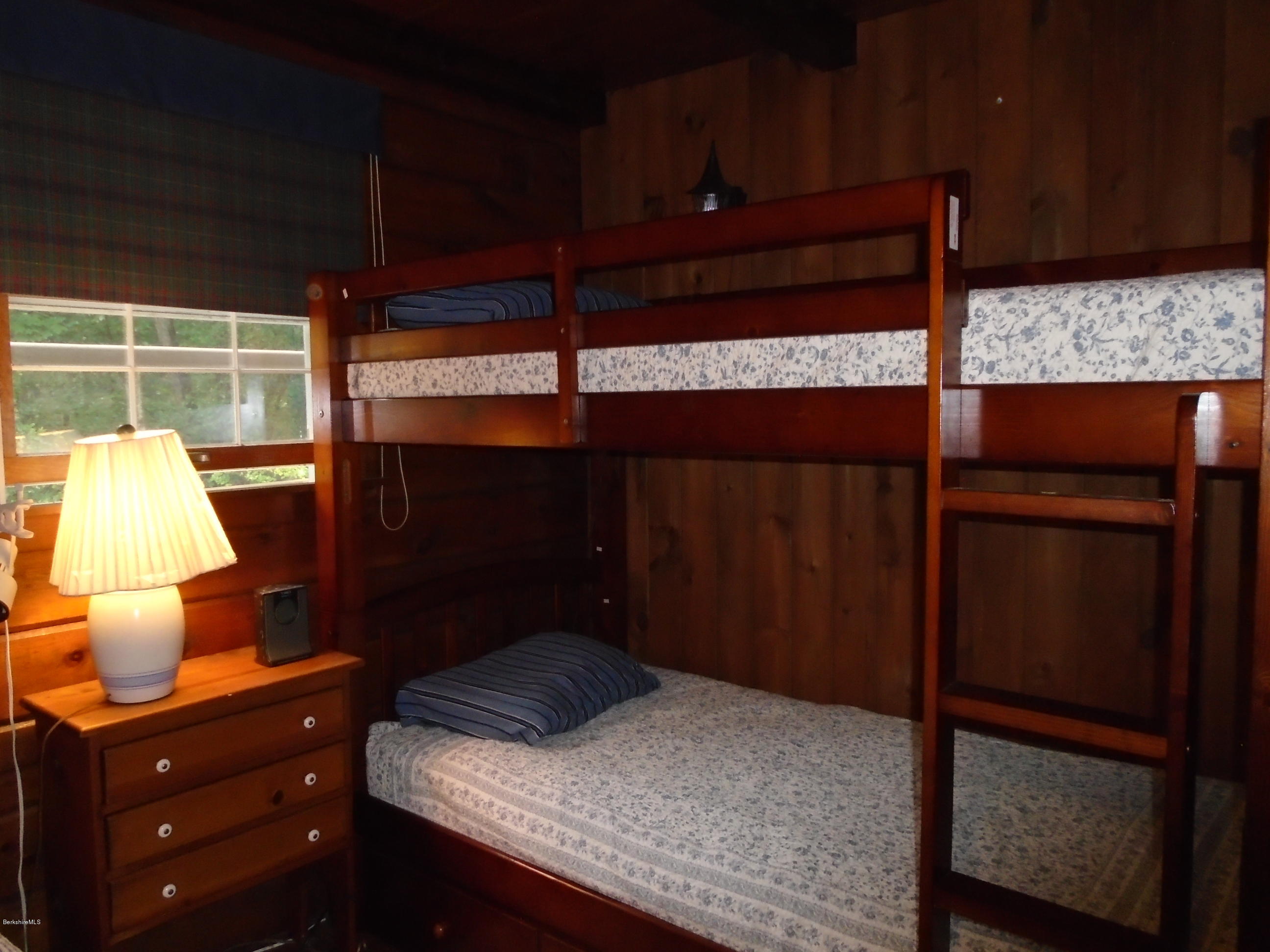 86 Peterson Road Becket, MA 01223 - Photo 27 of 52 a bedroom with a bed and a closet