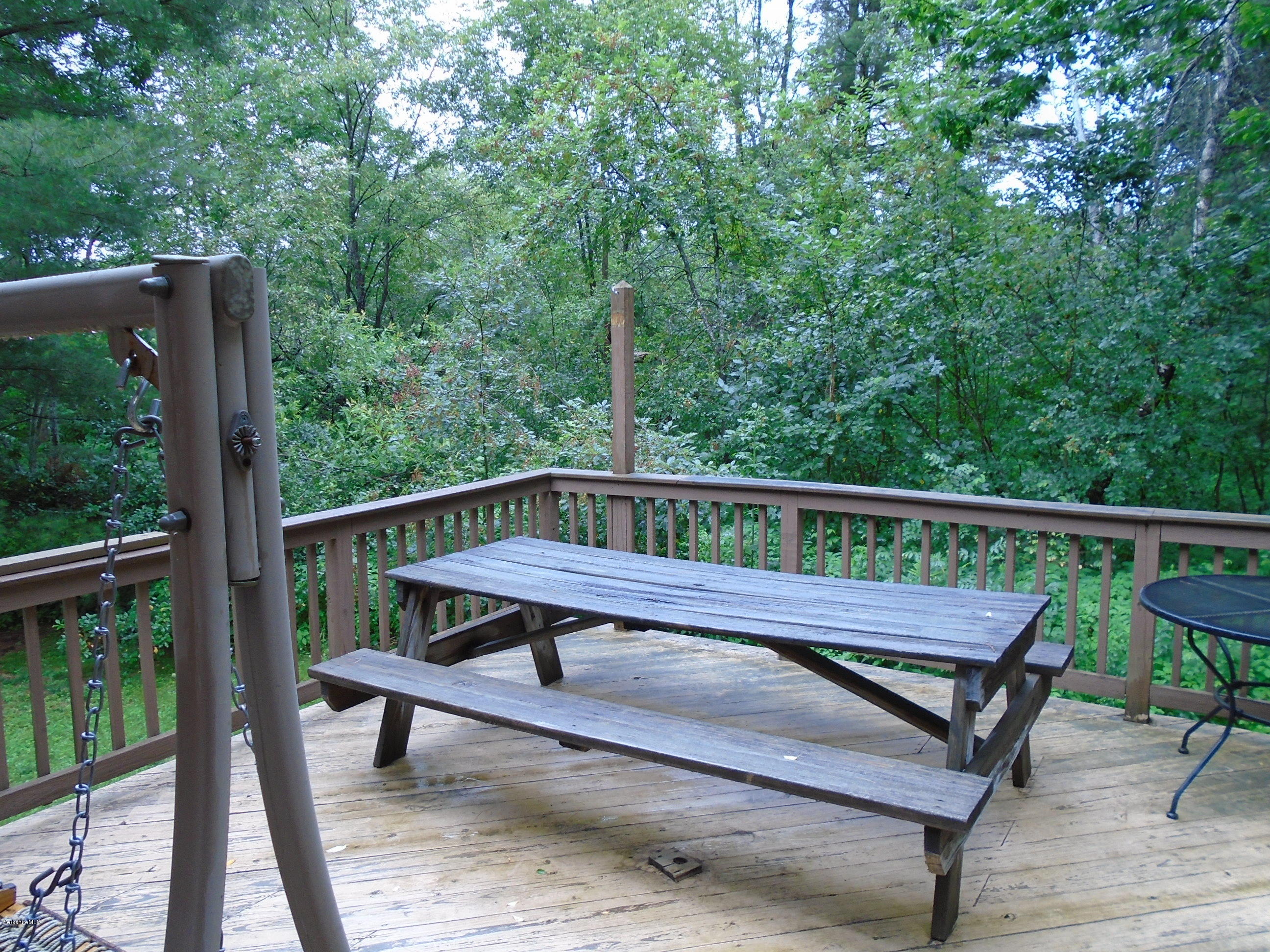 86 Peterson Road Becket, MA 01223 - Photo 30 of 52 a view of a bench in a balcony