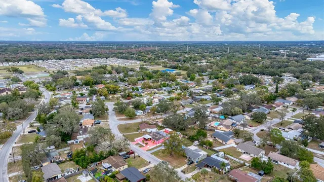 a front view of a house with yard