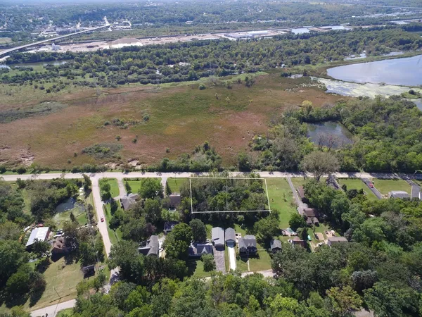 an aerial view of lake residential house with outdoor space