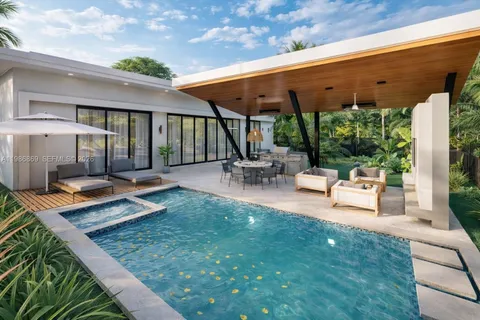 a patio with table and chairs