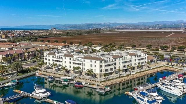 a view of a lake with multiple house