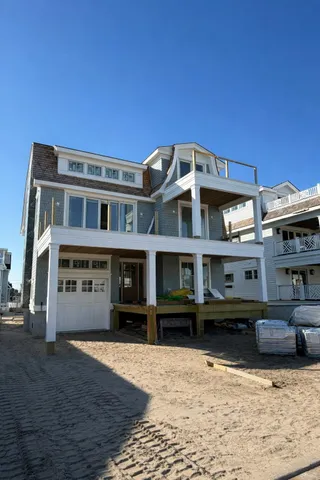 a front view of a building with many windows