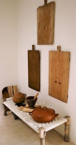 a view of backyard of house with seating space