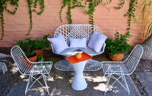 a view of a yard with swimming pool
