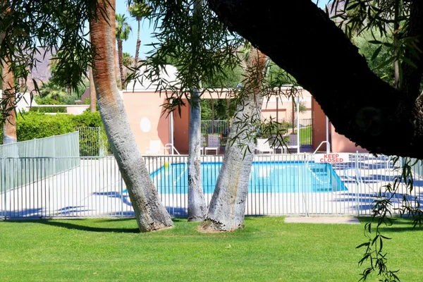 a view of a balcony with chairs