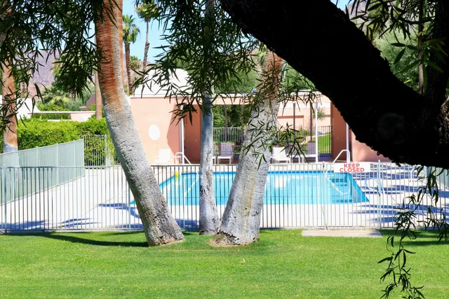 a view of a balcony with chairs