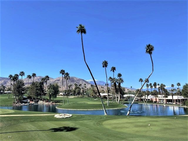 a view of a house with a swimming pool