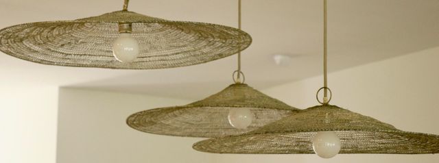 a living room with furniture and a book shelf