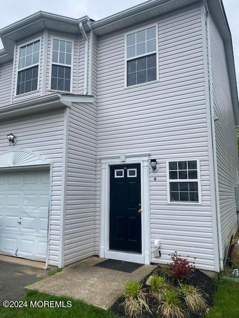 9 Esplanade Way Bayville, NJ 08721 - Photo 1 of 16 a view of a house with white door