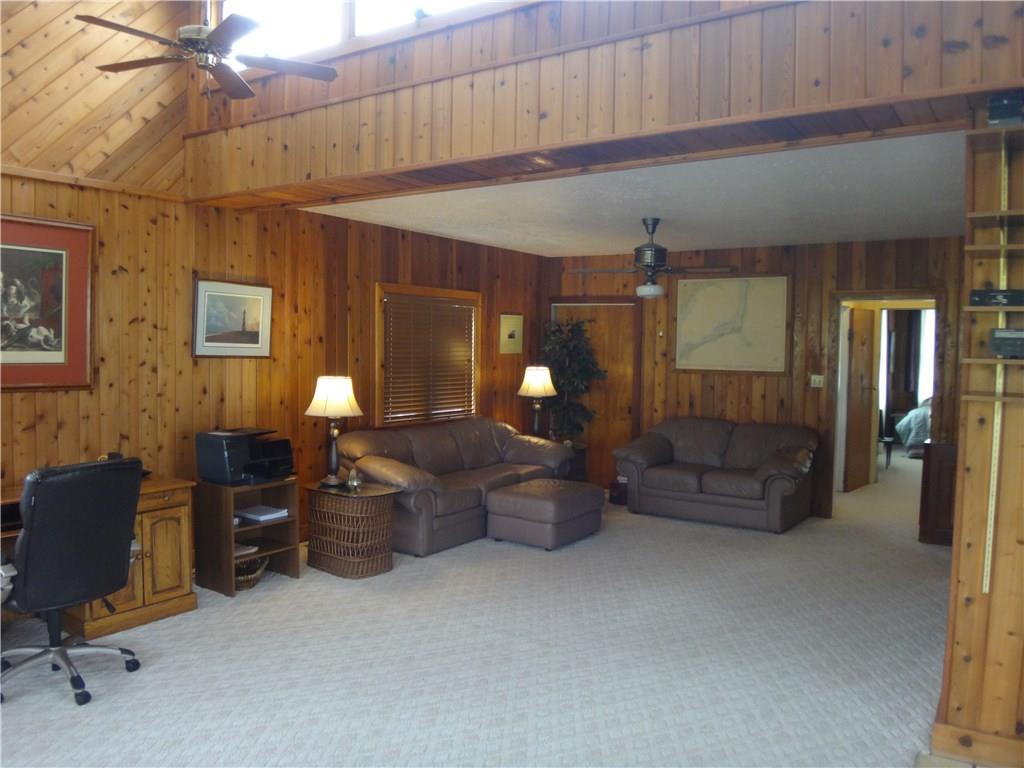 401 Bull Run Road Brownsville, PA 15417 - Photo 11 of 25 Huge family room with remote control upper windows.