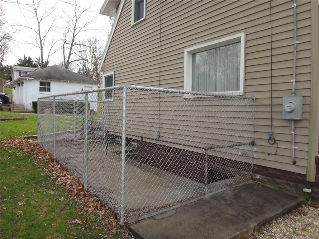 401 Bull Run Road Brownsville, PA 15417 - Photo 20 of 25 Attached dog pen with doggie door in the basement.