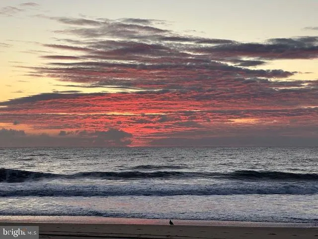 a view of water heater and wooden floor