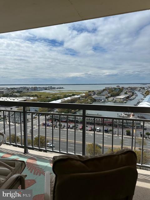 11604 Coastal Highway, Unit 1209 Ocean City, MD 21842 - Photo 20 of 20 a view of a balcony with chair and city view