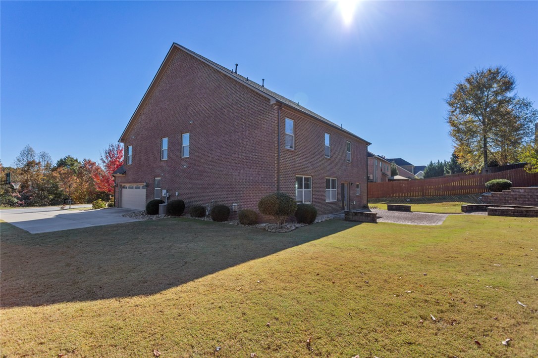 1005 Winmar Drive Anderson, SC 29621 - Photo 42 of 50 This spacious brick home features a lush lawn and ample outdoor living space.