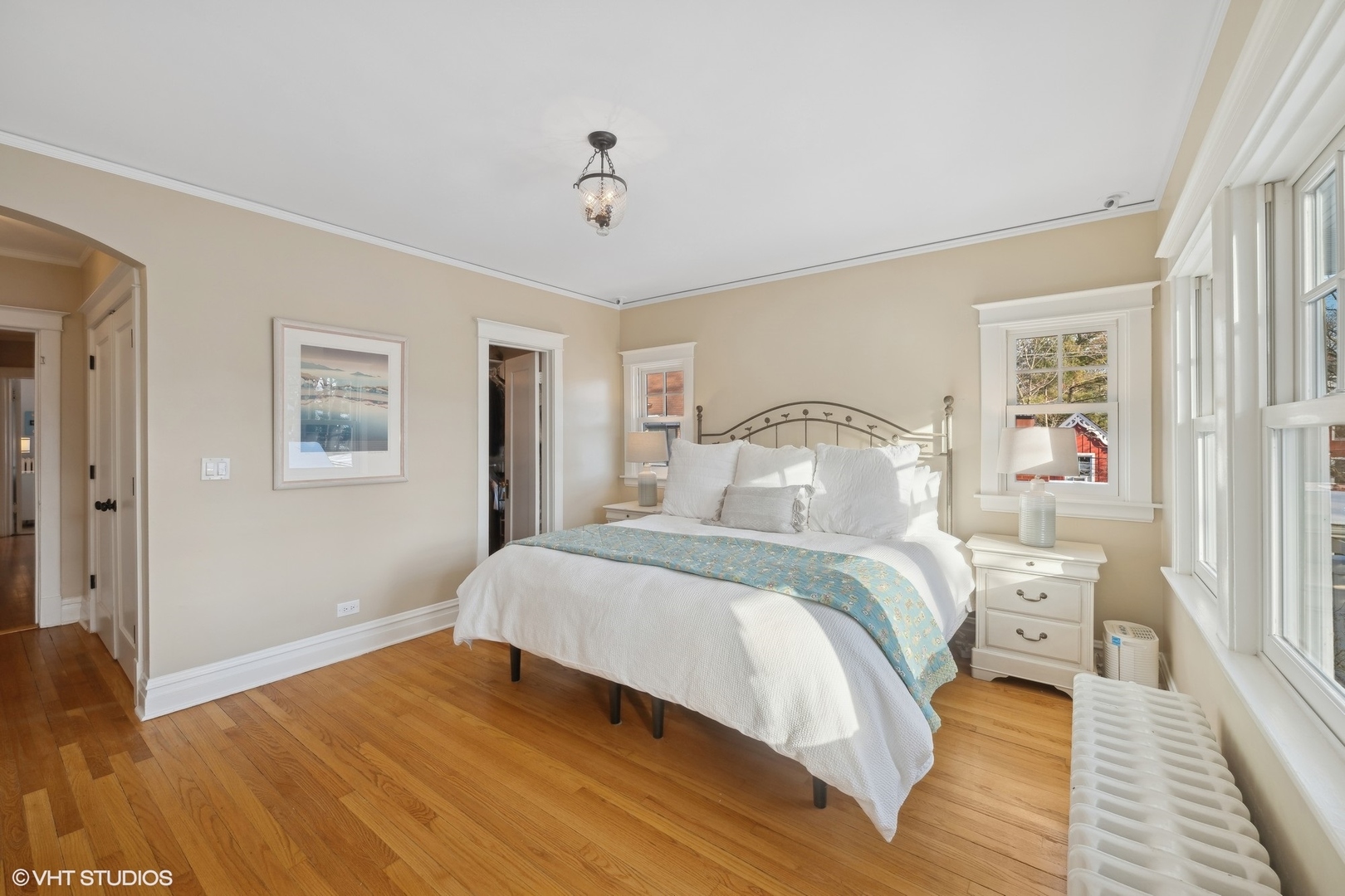 621 Maple Avenue Wilmette, IL 60091 - Photo 21 of 45 a bedroom with a bed and wooden floor
