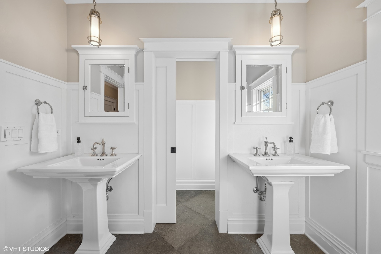 621 Maple Avenue Wilmette, IL 60091 - Photo 24 of 45 a bathroom with a sink and a mirror