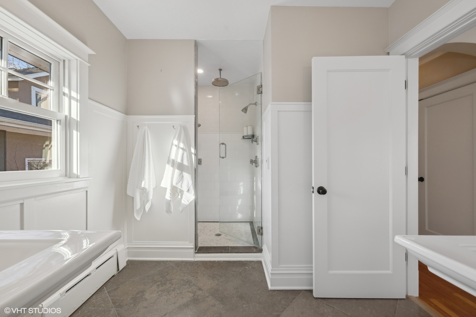 621 Maple Avenue Wilmette, IL 60091 - Photo 25 of 45 a bathroom with a tub shower and sink