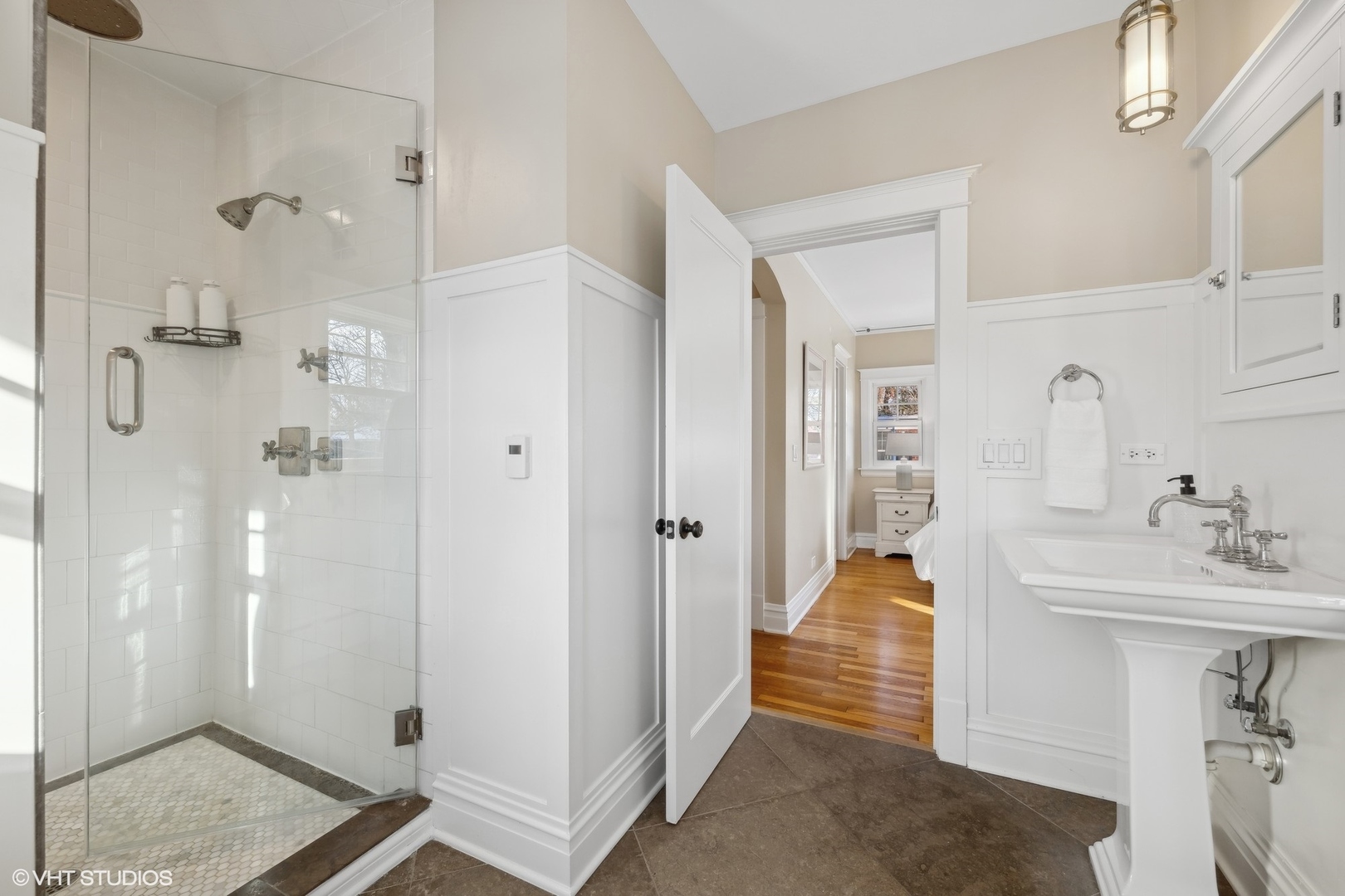 621 Maple Avenue Wilmette, IL 60091 - Photo 26 of 45 a bathroom with a sink and shower