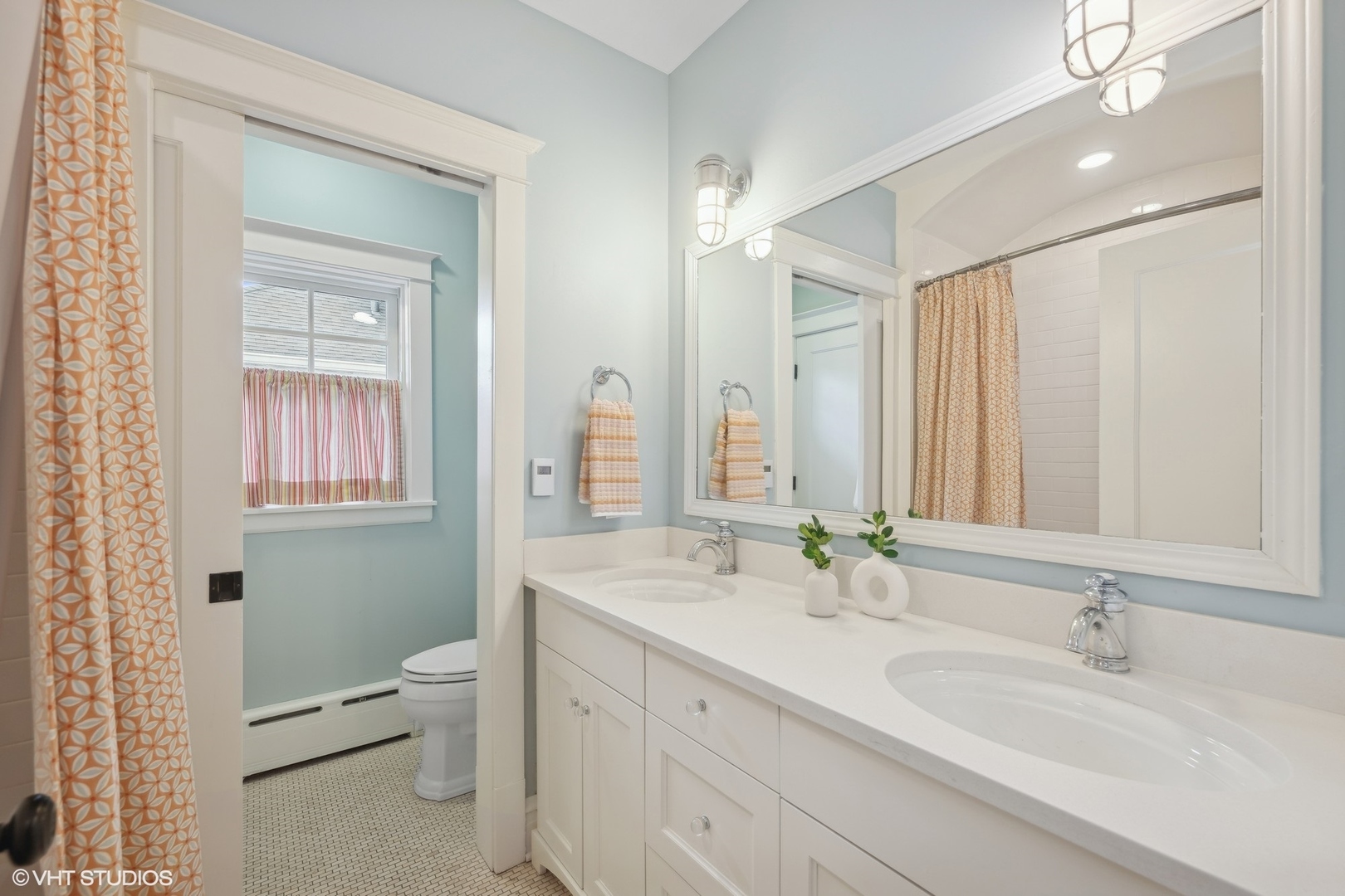 621 Maple Avenue Wilmette, IL 60091 - Photo 30 of 45 a bathroom with a granite countertop sink a toilet and a mirror