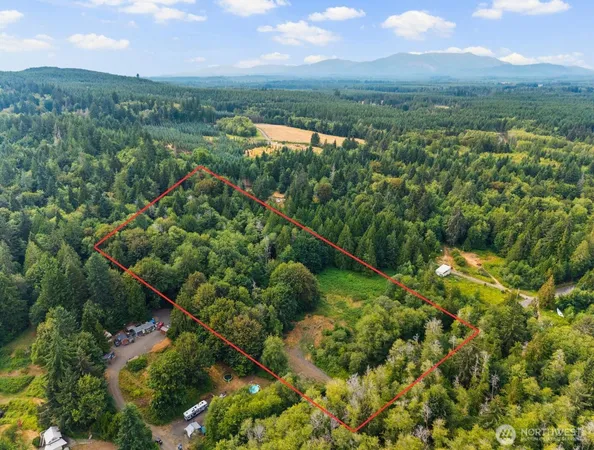 a view of a lake with a mountain
