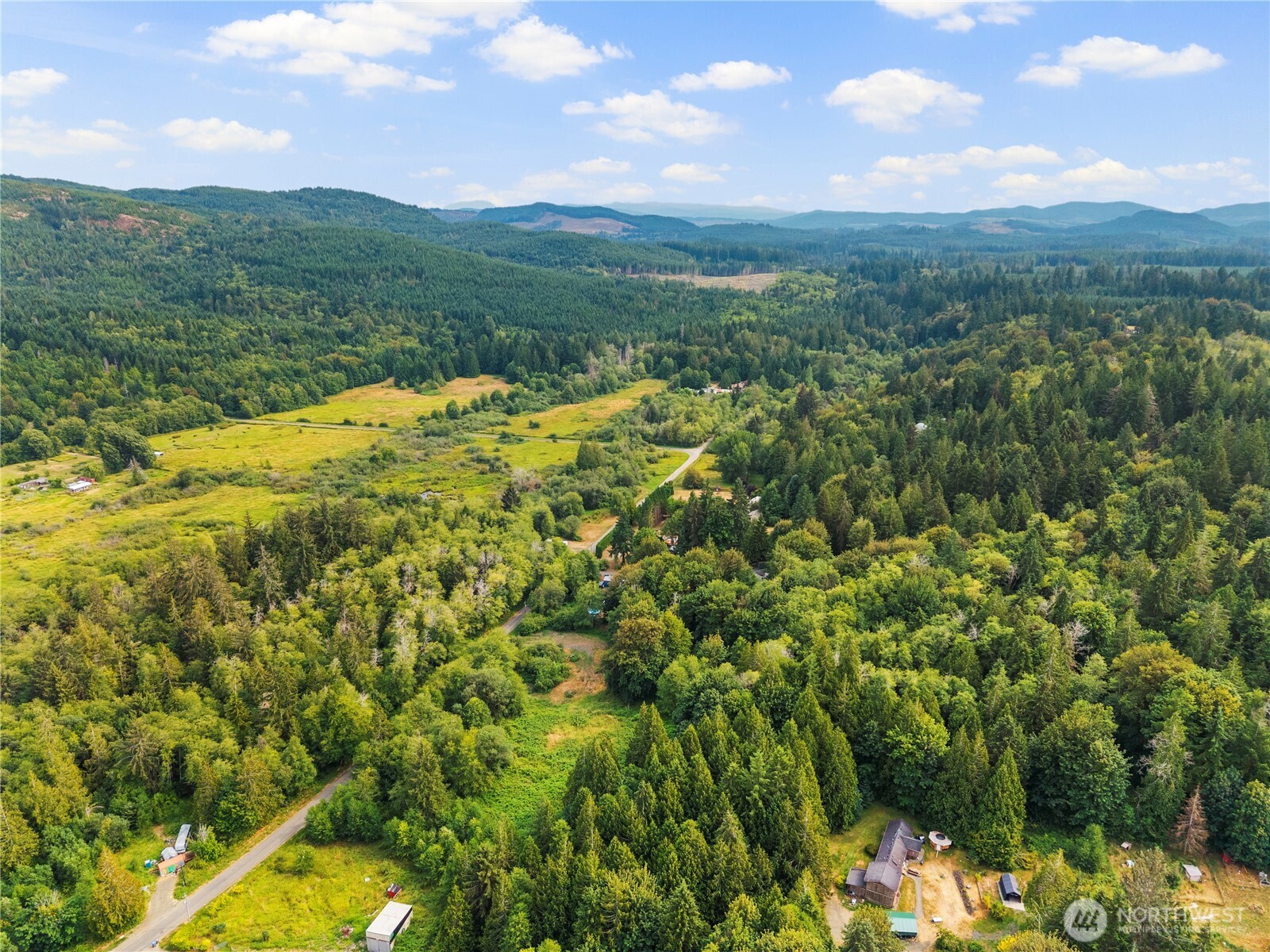 3211 West Little Egypt Road Shelton, WA 98584 - Photo 10 of 40 a view of a lake with a mountain in the background