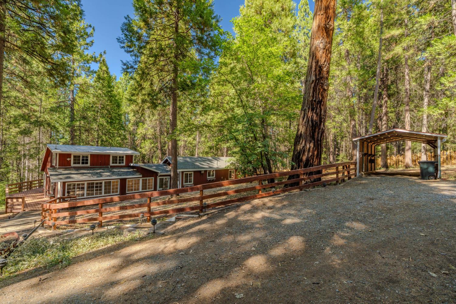19070 Allan Road West Volcano, CA 95689 - Photo 1 of 1 a view of a house with large trees