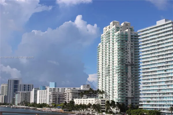 a view of a city with tall buildings