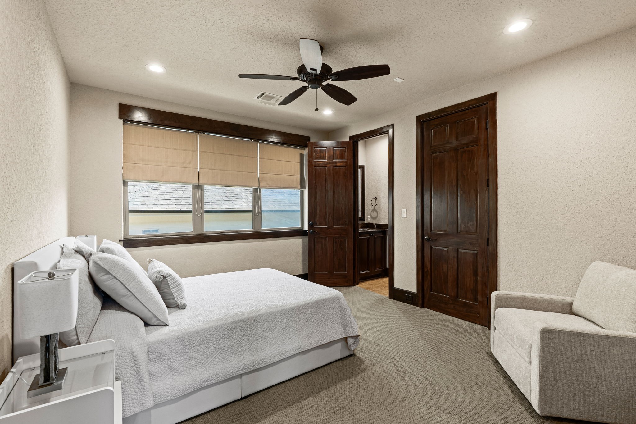 3751 Aberdeen Way Houston, TX 77025 - Photo 27 of 39 A comfortable secondary bedroom with generous natural light, a private en-suite bath, and a calm, functional layout ideal for guests or family living.