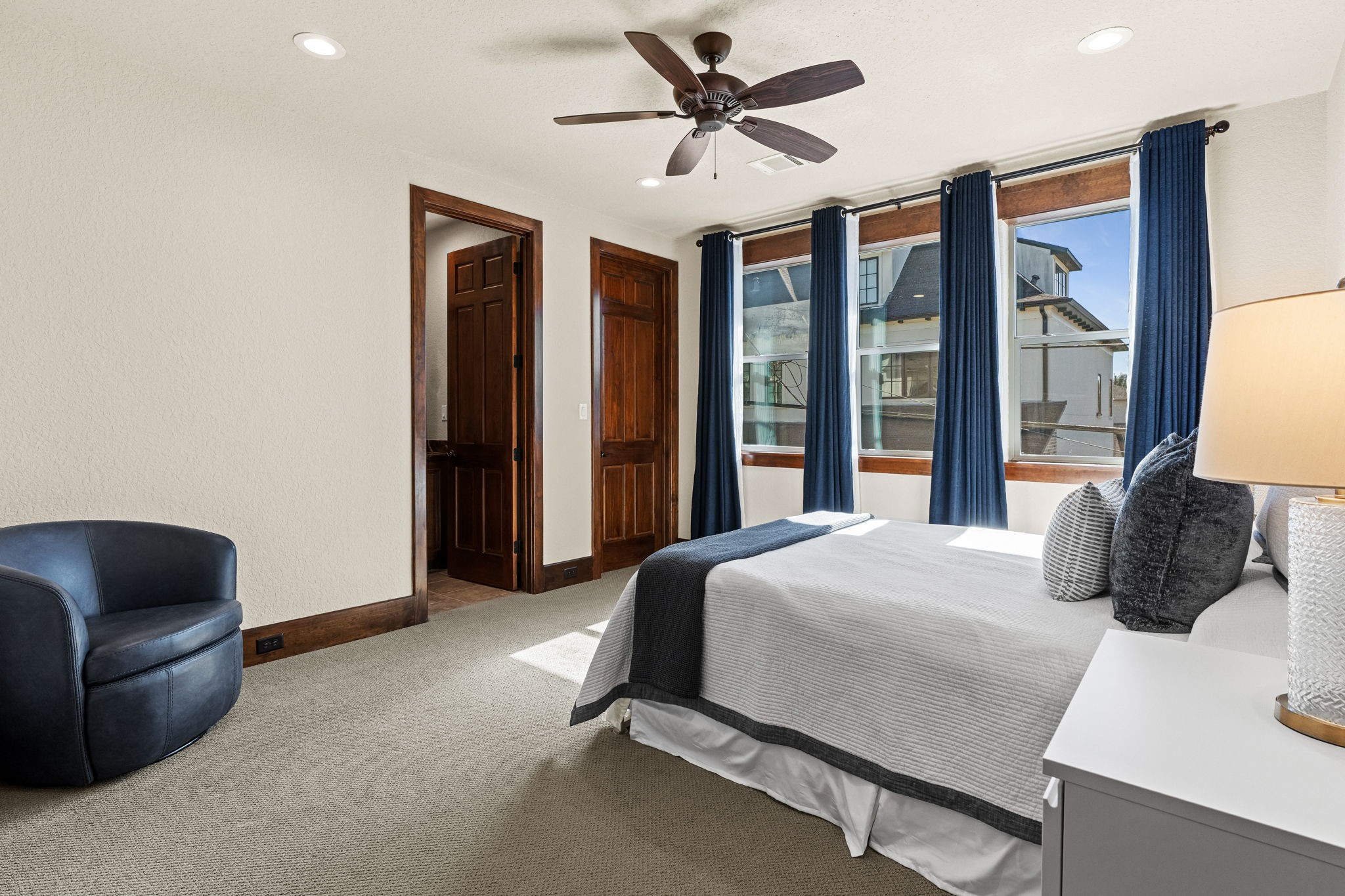 3751 Aberdeen Way Houston, TX 77025 - Photo 28 of 39 A bright secondary bedroom with large windows, ample natural light, and a clean, comfortable layout, offering a welcoming space ideal for guests or everyday use.