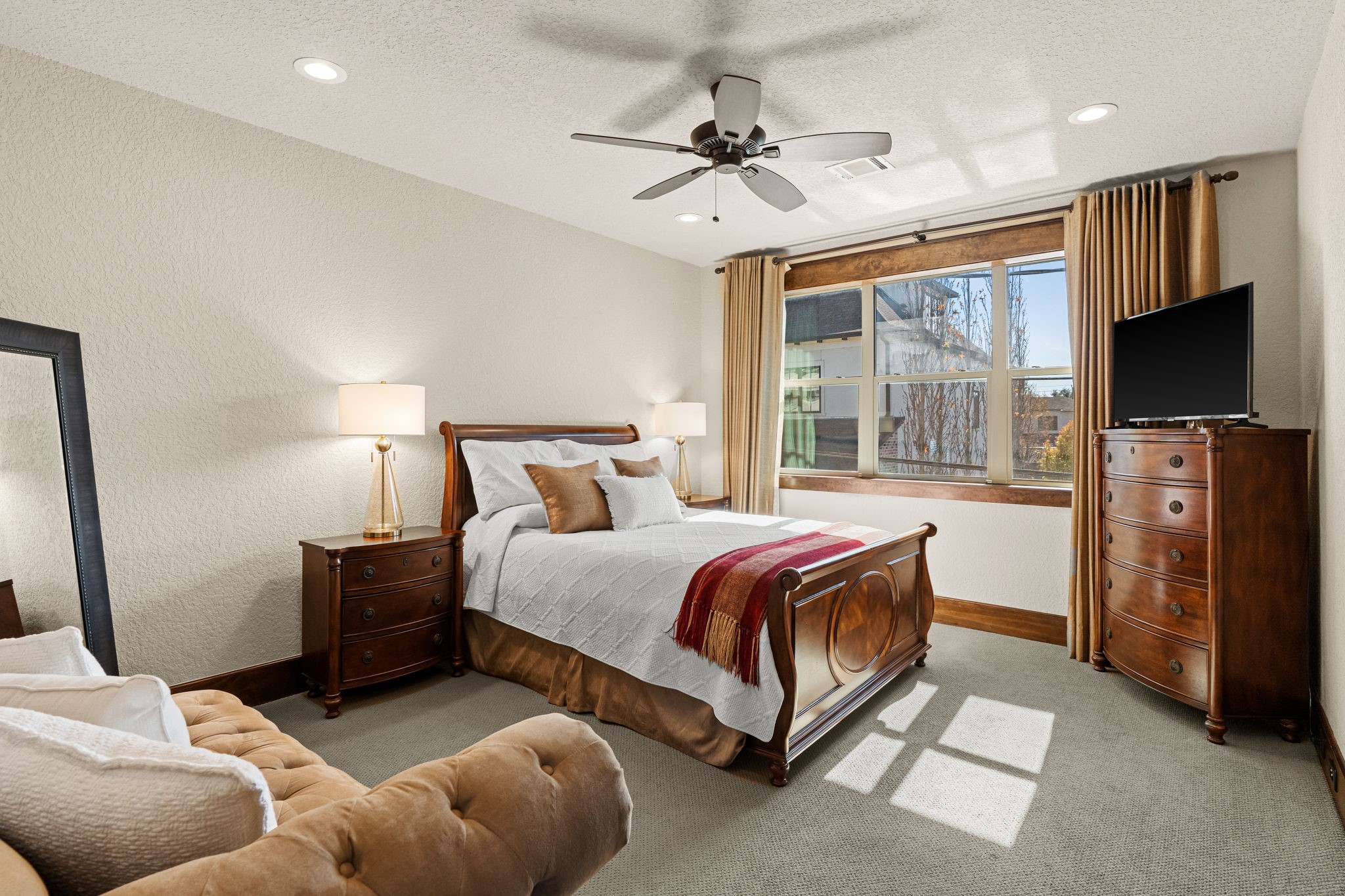 3751 Aberdeen Way Houston, TX 77025 - Photo 29 of 39 A spacious and sunlit secondary bedroom with broad windows, soft natural light, and a well-proportioned layout, creating a comfortable and relaxing retreat for guests or family.