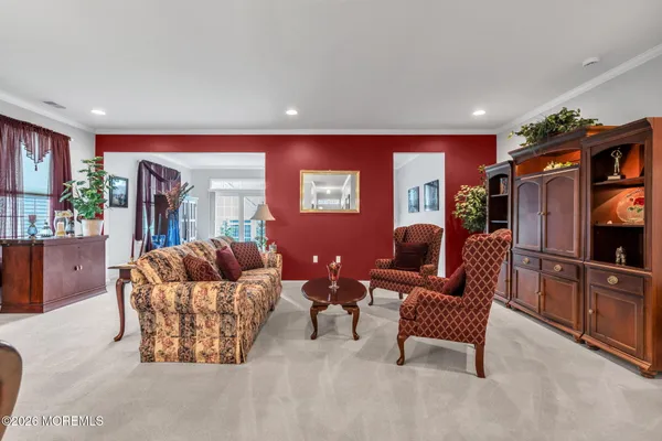 a view of livingroom with furniture and windows