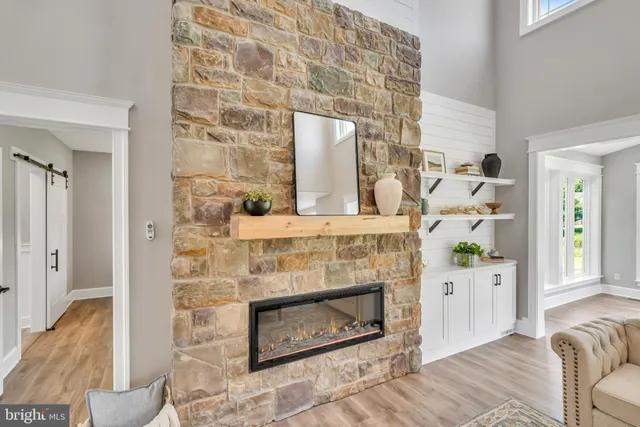 view of living room with a fireplace