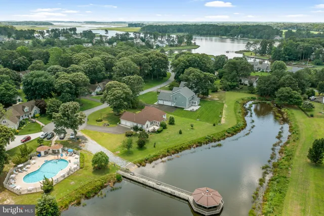 a view of a lake with a yard
