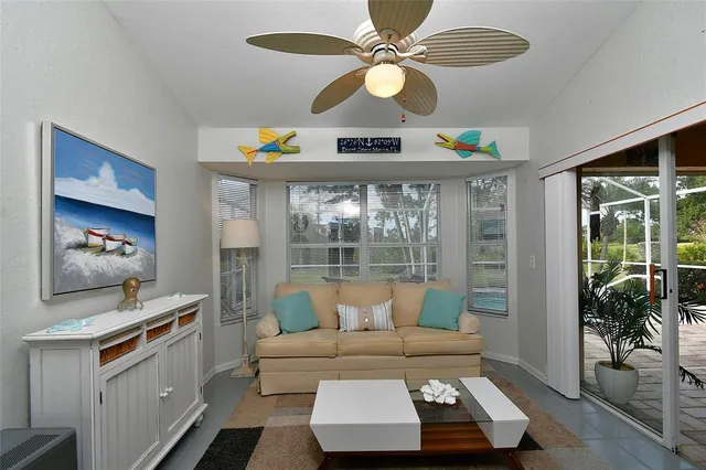 a living room with furniture and a window