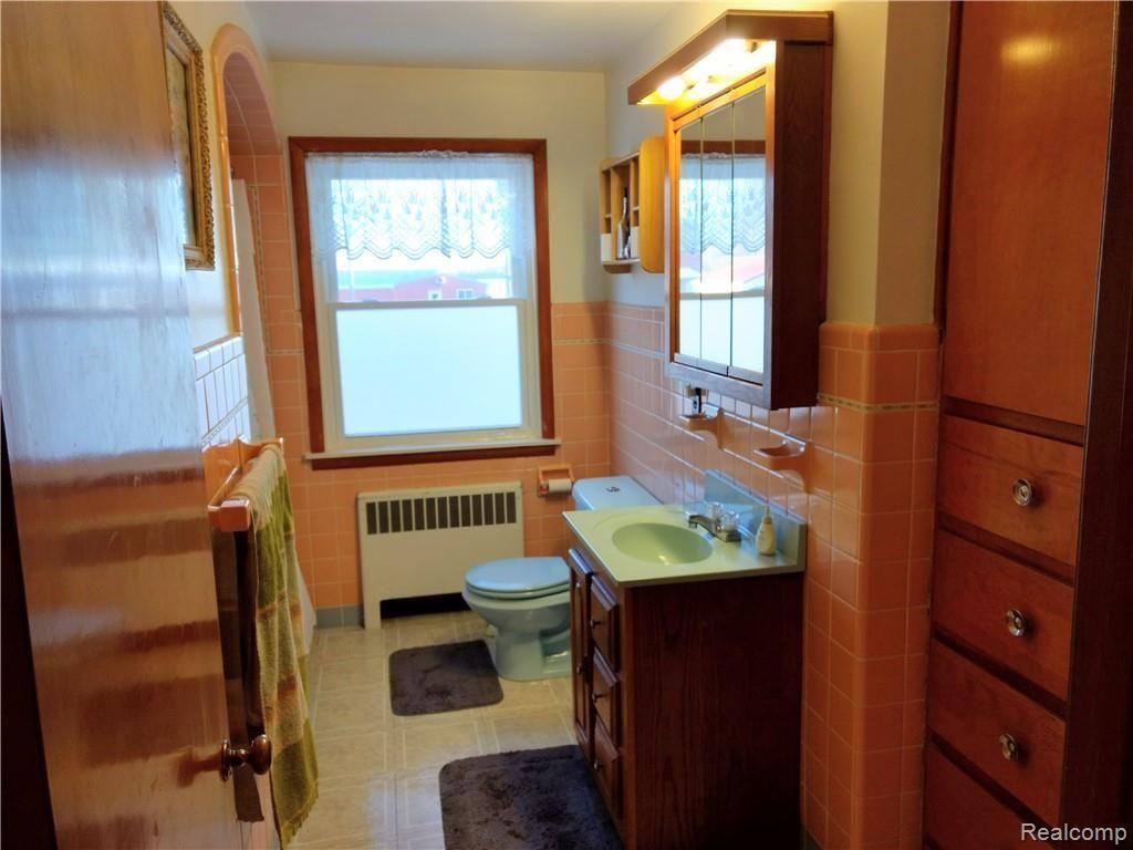 7565 Priemer Road Harbor Beach, MI 48441 - Photo 13 of 14 There are built ins in this bathroom