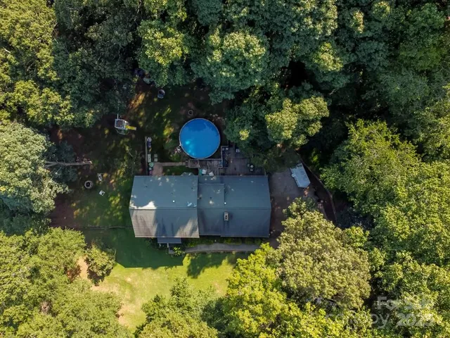 a view of a back yard with green space