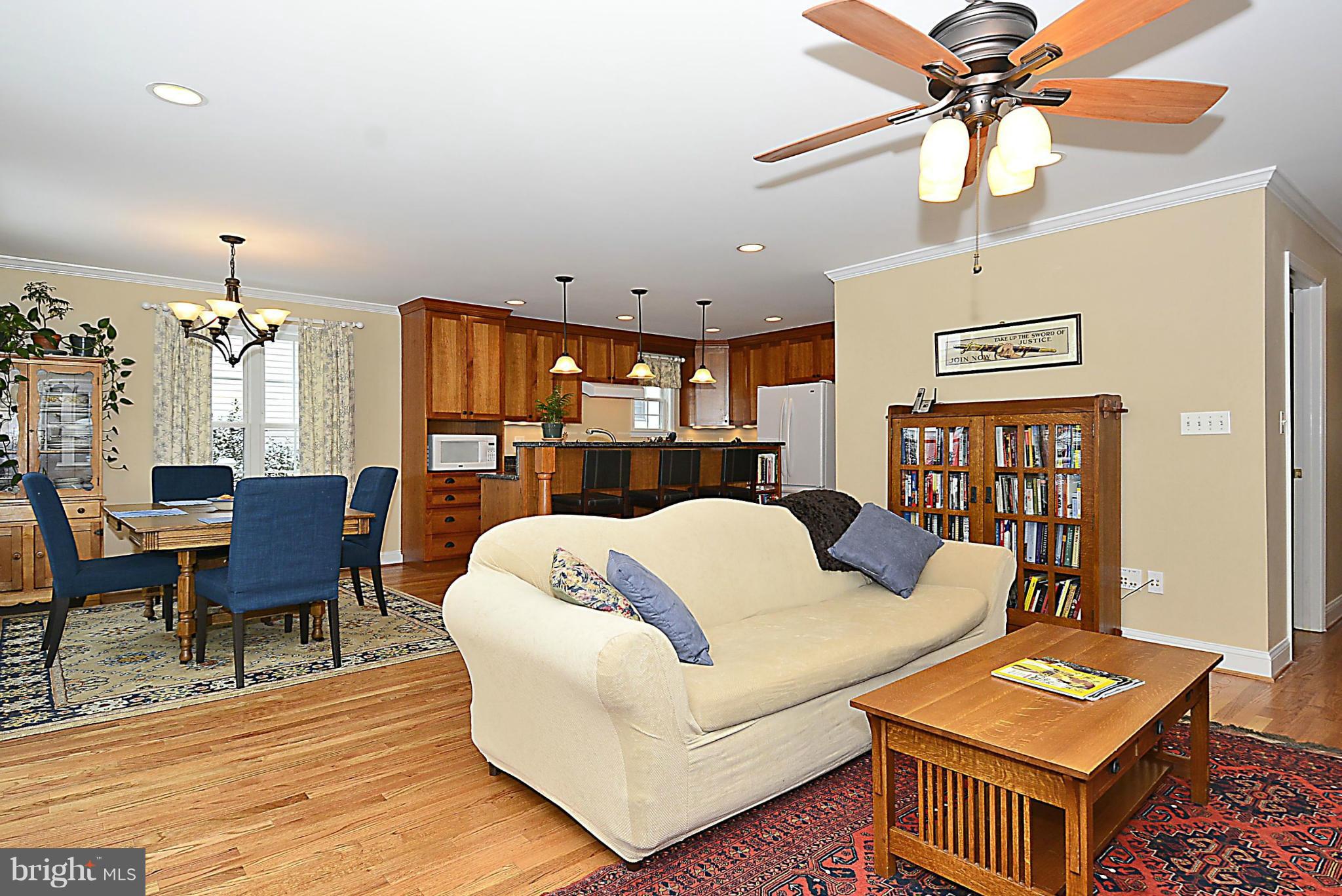 10504 Amherst Avenue Silver Spring, MD 20902 - Photo 11 of 30 a living room with furniture and a dining table