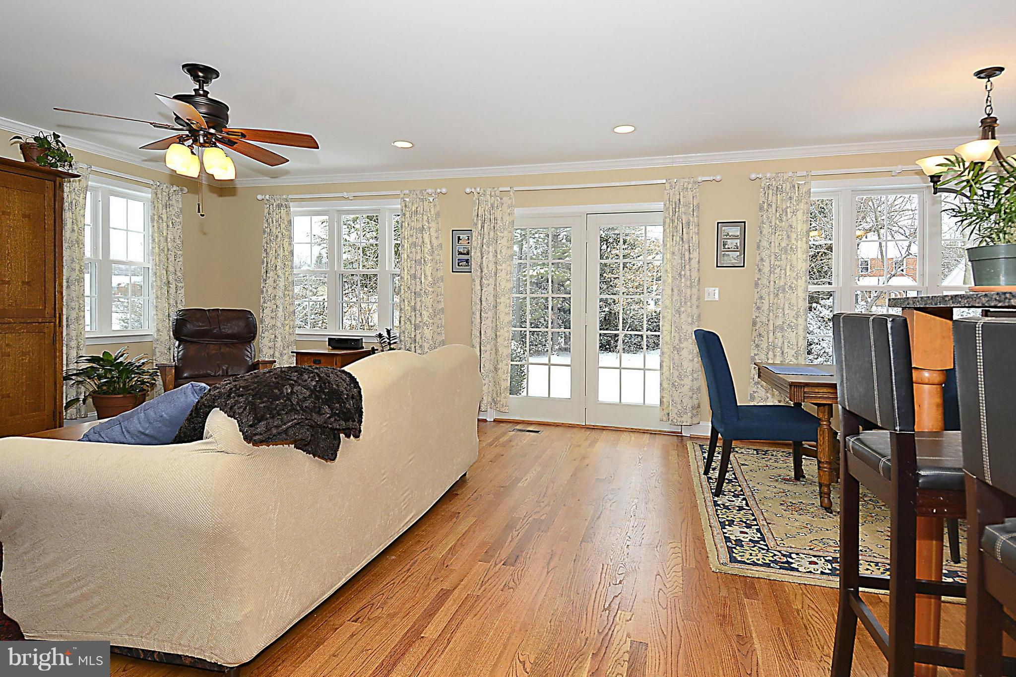 10504 Amherst Avenue Silver Spring, MD 20902 - Photo 12 of 30 a living room with furniture and a large window