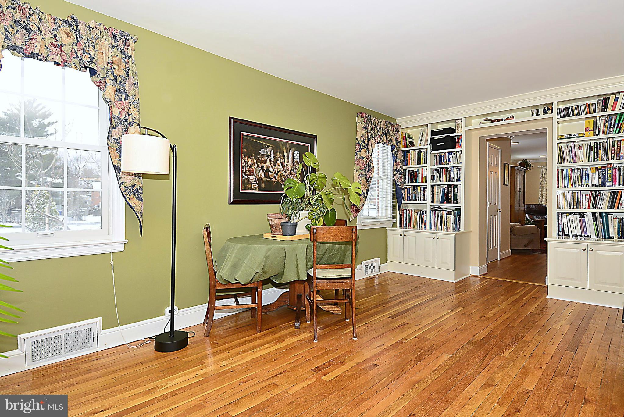 10504 Amherst Avenue Silver Spring, MD 20902 - Photo 18 of 30 a living room with furniture and a wooden floor