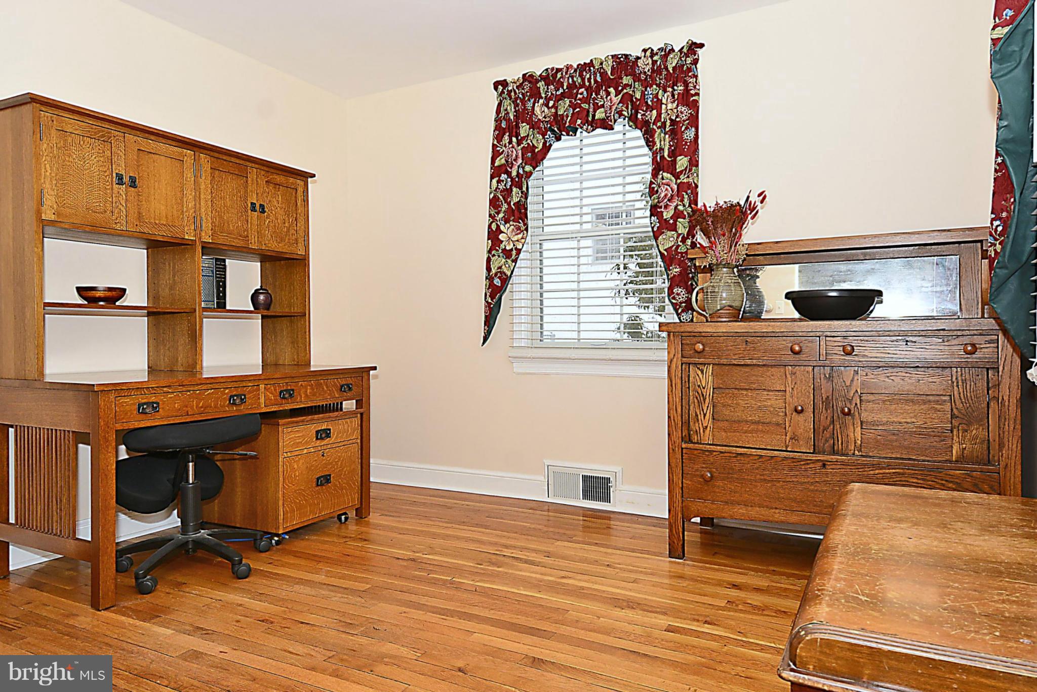 10504 Amherst Avenue Silver Spring, MD 20902 - Photo 20 of 30 a view of a kitchen with wooden floor and electronic appliances