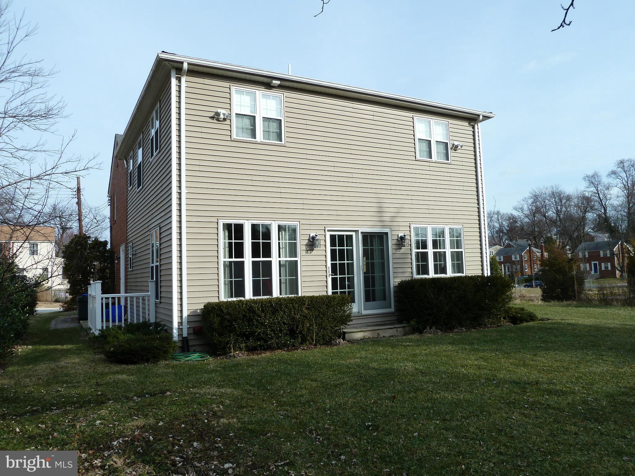 10504 Amherst Avenue Silver Spring, MD 20902 - Photo 3 of 30 a view of a house with backyard and garden