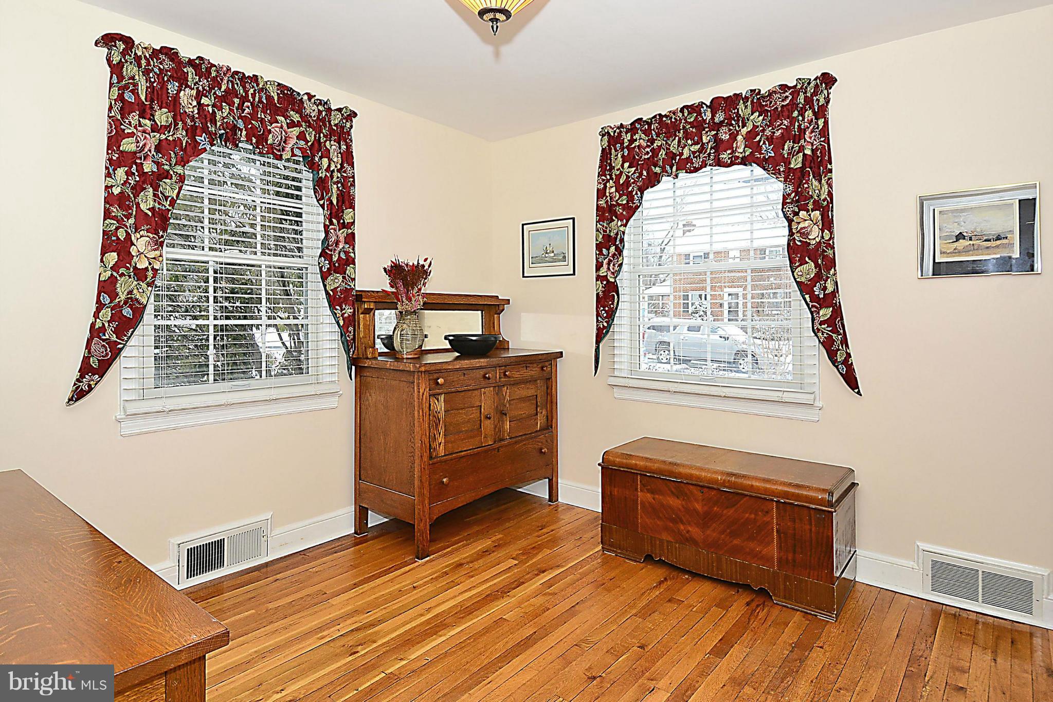 10504 Amherst Avenue Silver Spring, MD 20902 - Photo 21 of 30 a view of workspace with wooden floor and windows