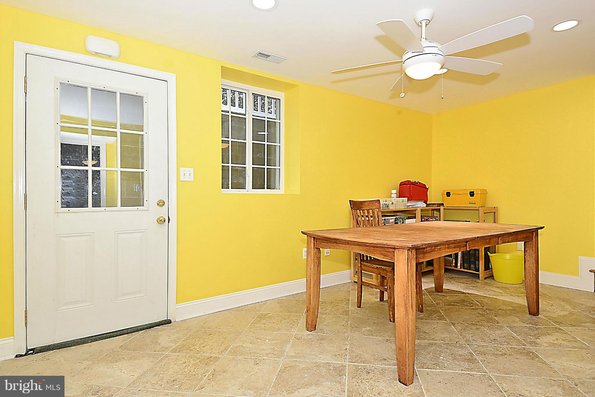 10504 Amherst Avenue Silver Spring, MD 20902 - Photo 24 of 30 a view of a dining room with a table and chairs