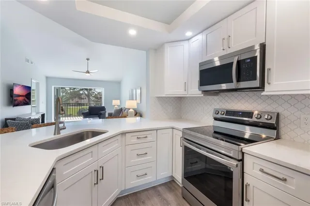 $387,000 | 774 Wiggins Lake Drive, Unit 203, Naples, FL 34110