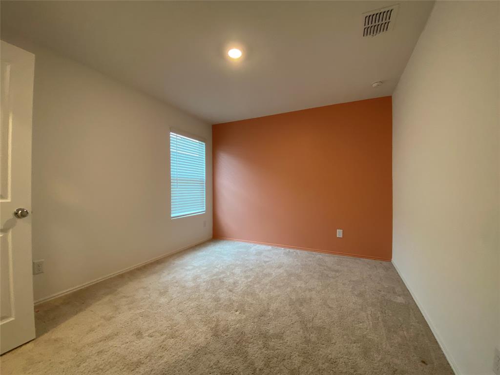 5911 Nyquist Way Forney, TX 75126 - Photo 13 of 38 an empty room with windows