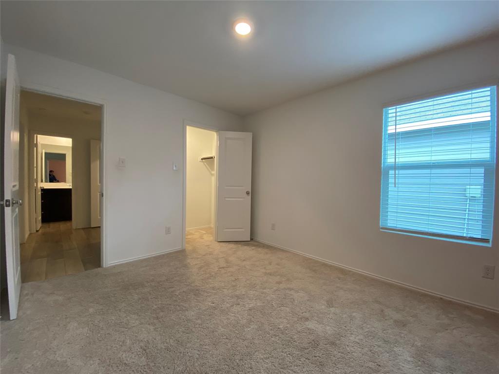 5911 Nyquist Way Forney, TX 75126 - Photo 14 of 38 an empty room with windows