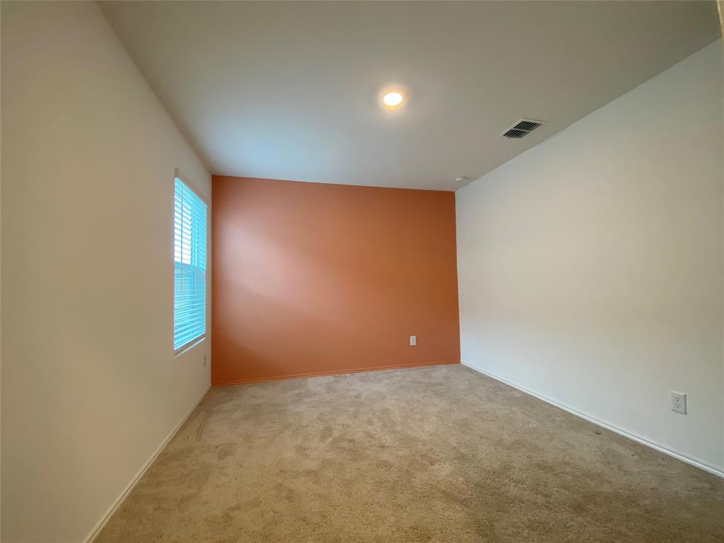 5911 Nyquist Way Forney, TX 75126 - Photo 16 of 38 an empty room with windows