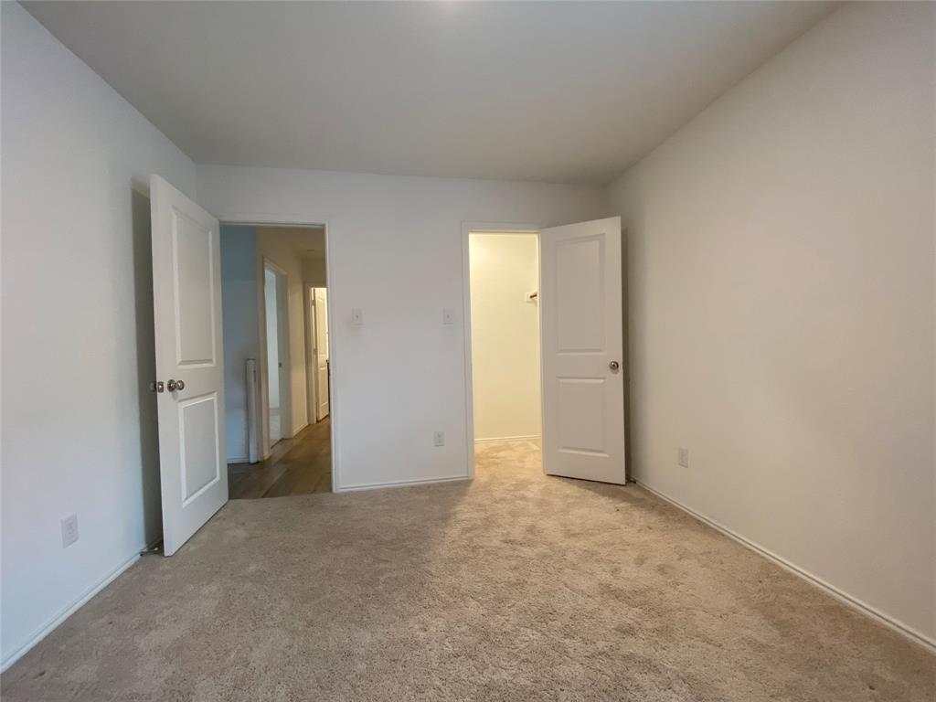 5911 Nyquist Way Forney, TX 75126 - Photo 18 of 38 a view of an empty room and closet area